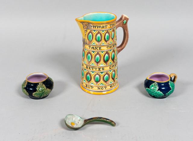 Collection of Majolica: 4 pieces of majolica. A Victorian Wedgwood ale mug with inscription bands on a yellow ground with a turquoise interior. Impressed Wedgwood mark and number 638 on the underside. 6 3/4" H x 3" Diameter.