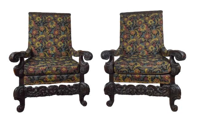 Pair of Baroque Carved Needlepoint Armchairs: Pair of Baroque Carved Needlepoint Armchairs; Ornately Carved on Curled Feet. 48" H X 30 " L X 34" W