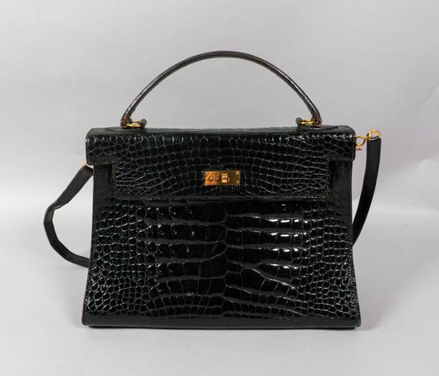 Vintage Balenciaga Crocodile Bag: Vintage Balenciaga handbag with gold hardware, velvet interior, detachable shoulder strap. Metal label on the interior. 9" H x 12 " L not including top handle. From the collection of the Salmagundi Cl