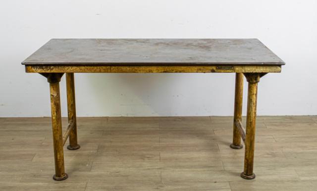 Textile Machine Works Industrial Table: Textile Machine Works industrial steel table. Metal label The "Reading" Steel Table - Textile Machine Works - US Pat. Office. 32" H X 61 1/4" W X 31 1/4" D. From the Roman and Williams designed 211 El