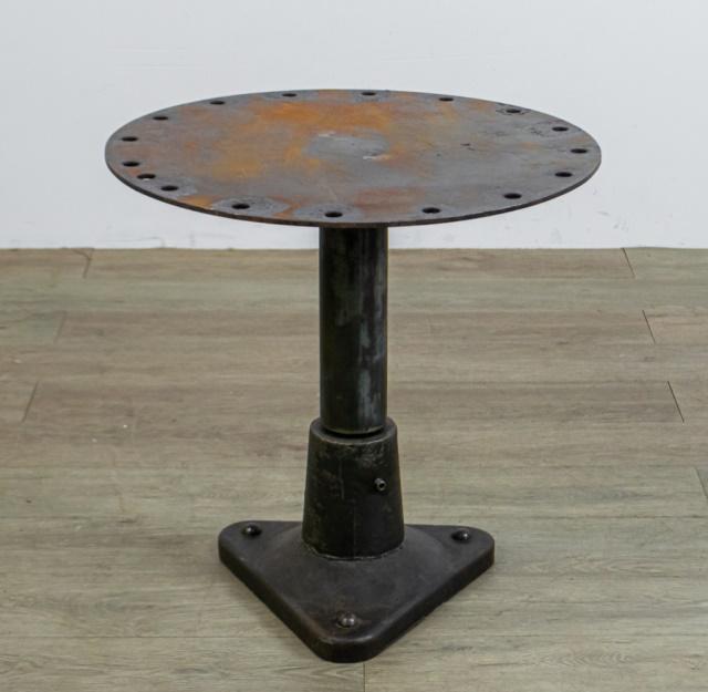 Industrial Metal Side Table: Industrial metal side table. 20 3/4" H X 21" Diameter. From the Roman and Williams designed 211 Elizabeth Street in New York City.