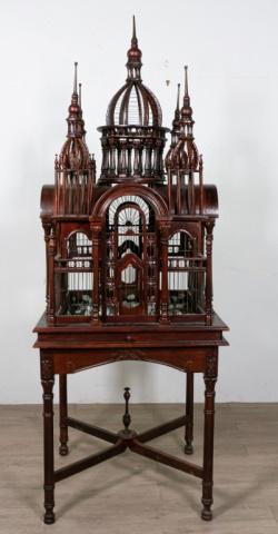 Maitland-Smith Victorian Style Bird Cage: Maitland-Smith Victorian Style bird cage. Late 20th Century. Two part form, upper cage with center dome and four turrets, Palladian style front door, pull-out cleaning slide, base with turned tapered