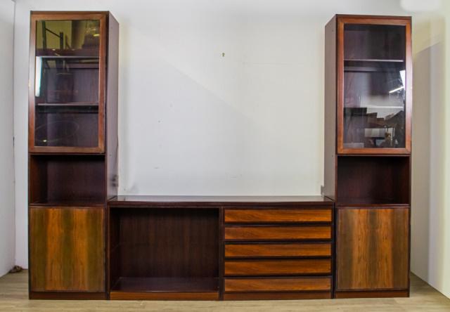 Scanflex Danish Modern Rosewood 3 Section Cabinet: Danish Modern 3 piece rosewood wall unit. Glass doors open to shelves. Center unit has 5 drawers on right side and open shelves on left side. 7 shelves not pictured. Overall: 112" L X 16" D X 84" H Cr