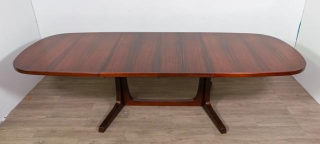 Niels Moller Danish Modern Dining Table: Niels Moller Danish Modern dining table. Danish, Mid 20th Century. Rosewood table with two removable leaves. Wear consistent with age. With leaves: 29" H x 114" L x 43 1/2" D Without leaves: 29" H x 7
