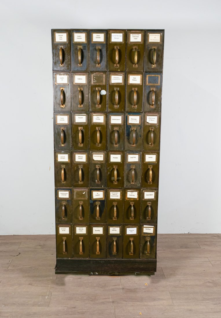 Salmagundi Metal Employee Mail Cabinet: Salmagundi metal employee mail cabinet. American, Early 20th Century. Metal cabinet with 26 doors with brass handles, originally holding correspondence between members of the Salmagundi Club, the olde