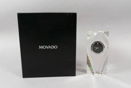 Movado Glass Desk Clock: Movado molded glass desk clock in original box. 7" H