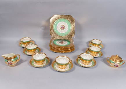 25 Piece Longton Bone China Tea Service: 25 piece Longton bone china tea service. English, Mid 20th Century. 9 plates, creamer and sugar, and 7 tea cups and saucers featuring gilt edges and sea foam green border, with floral motif and gilt