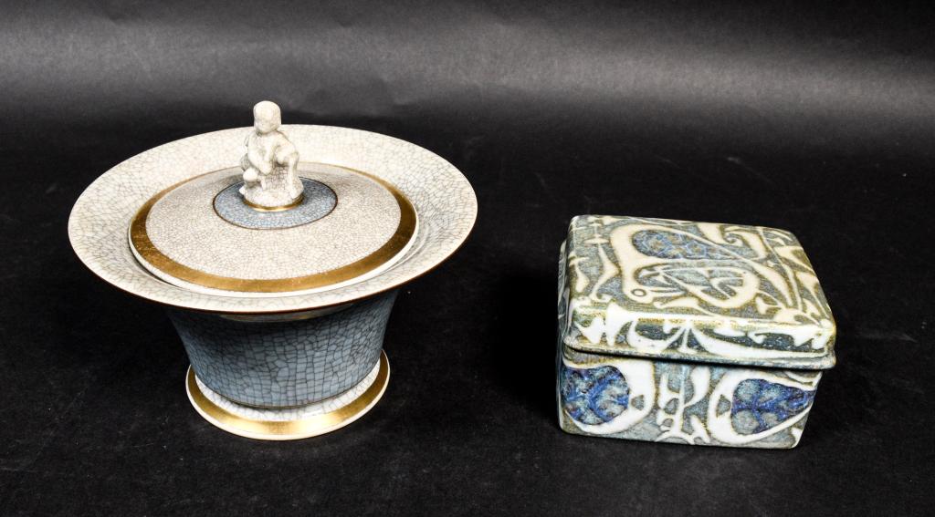 Royal Copenhagen Faience Box and Crackle Jar: Royal Copenhagen Faience box by Nils Thorsson # 716/3104 and crackle jar, gilt rim with putti handle, #458/ 2500. Largest: 4 3/4" Height.