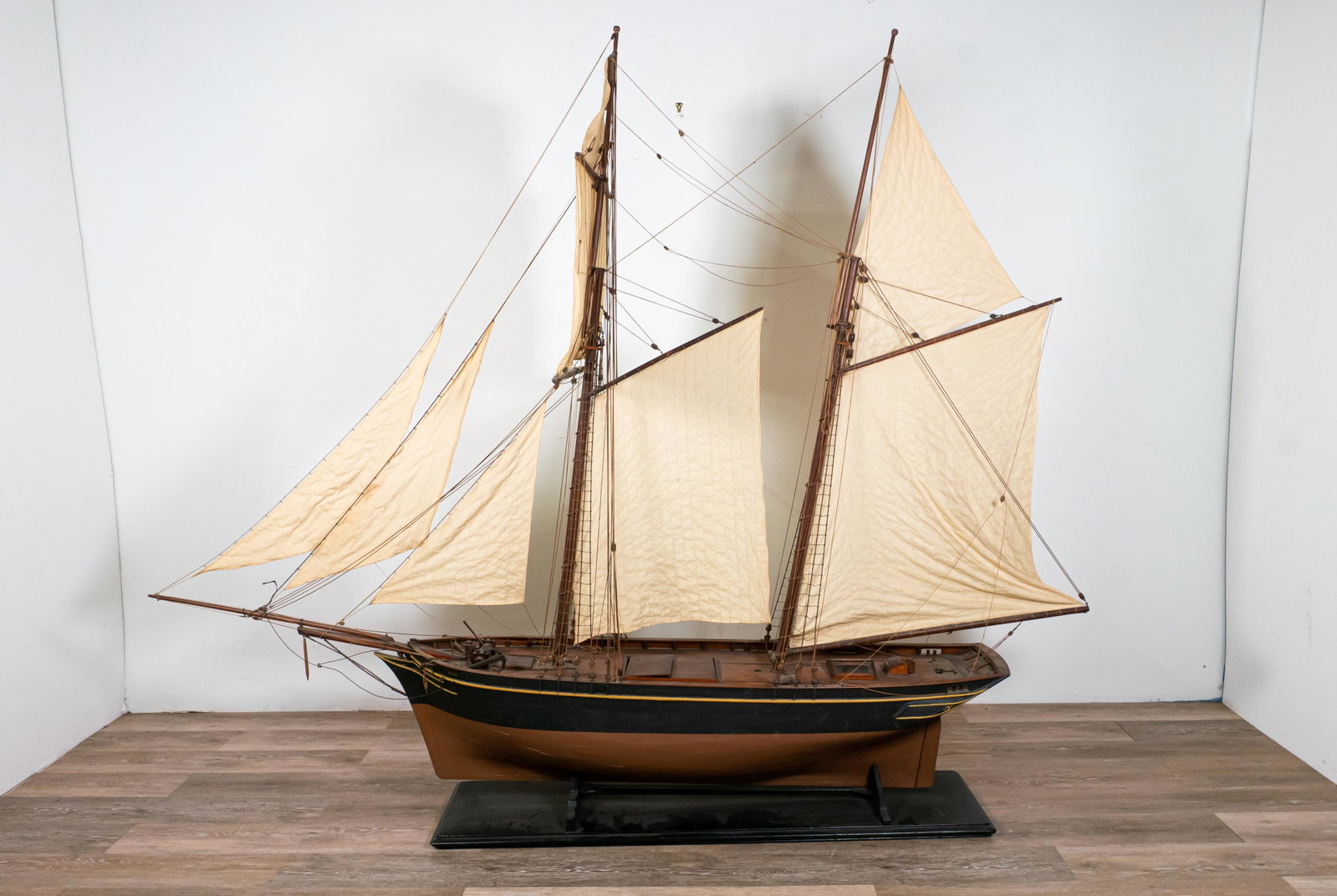 Scratch Built Maritime Sailing Ship Model: The "May" a two mast sailing ship model. Plaque states ""May" Two Masted Topsail Schooner Restoration 1986 Mr. and Mrs. William Maclehose". Some popping of boards on hull. Deck has some minor cracks. 