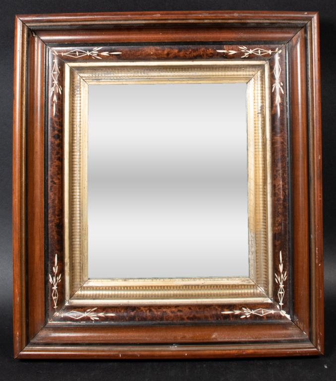 Mahogany and Striped Maple Mirror: Mahogany and striped maple mirror. Early 20th Century. Mirror with four "tiers" of molding with different woods and finishes, striped maple molding adorned with relief carvings in corners. Loss to bot
