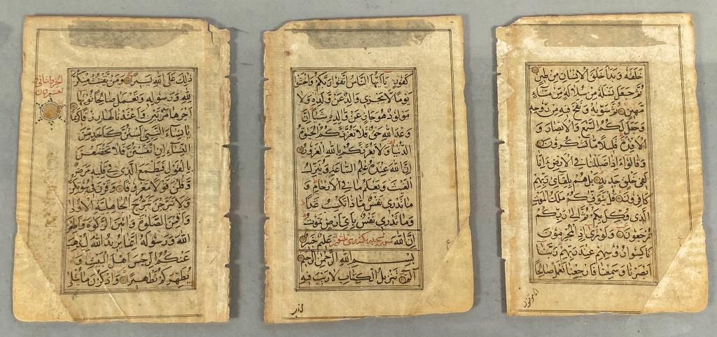 14th Century Quran Folio: 14th century Quran folio of Iranian, Persian origin. 3 double side panels written in Muhaqqaq script. Creases to paper, foxing to the edges, adhesive residue on the top portion of the page. Framed and