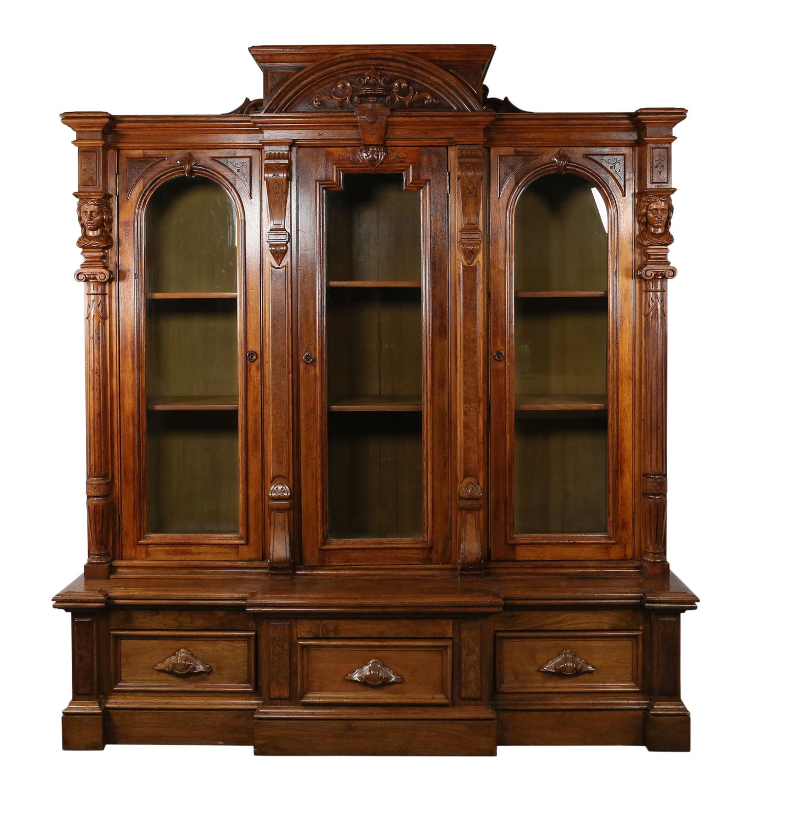 Aesthetic Movement Bookcase Attributed to Jelliff: Aesthetic Movement Classical Revival bookcase attributed to John Jelliff (American, Newark, New Jersey, 1813-1893). Circa 1880s-1890s. Ornately carved and stained walnut and burl, crown with fretwork,