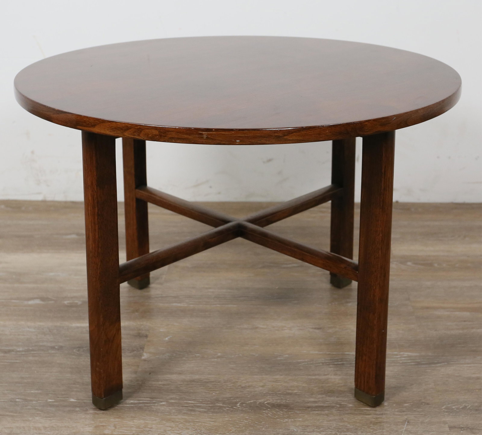 Edward Wormley Style Dunbar Side Table: Dunbar side table in the style of Edward Wormley (American, 1907-1995). Berne, Indiana, 20th century. Mahogany, circular top, Arts and Crafts form, four square stock legs. Dunbar label on underside of