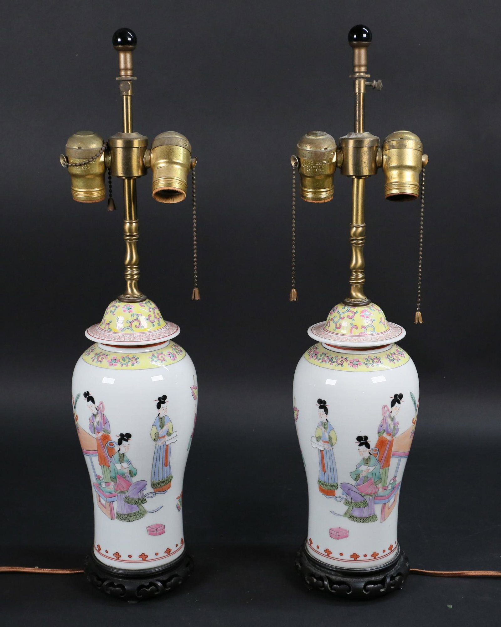 Pair of Chinese Porcelain Lamps: Pair of Chinese porcelain lamps. Minor paint loss to decoration, cords frayed. Each 21 1/2"H including finials.