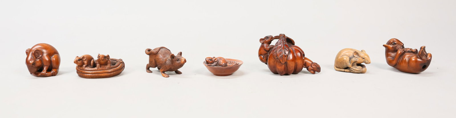 7 Carved Wood Rat Netsuke: 7 Chinese carved wood netsukes, mouse, chipmunk and rat netsukes. All signed. Netsuke with pumpkin 2 1/4"W. Tail cracked on one.