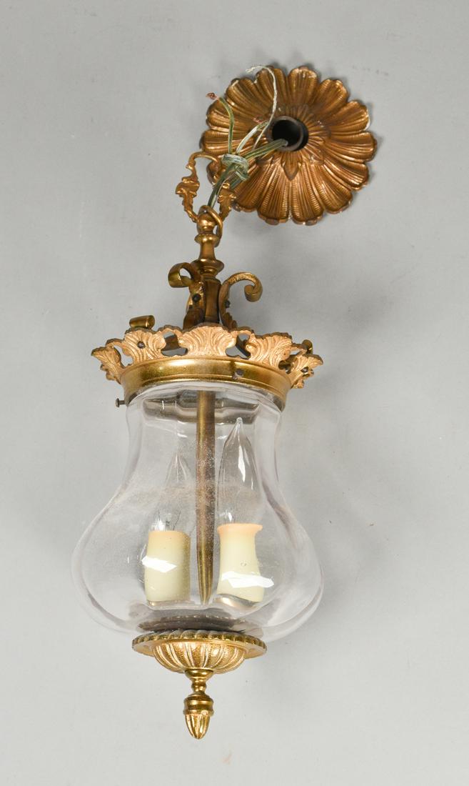 Bronze Hall Fixture: Bronze hall fixture with glass shade. 16" L. Residue to the interior of the glass shade. Untested.