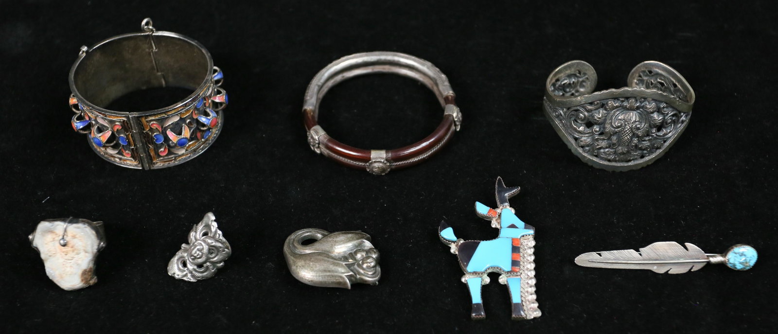 Silver Jewelry Lot: 8 piece jewelry lot. 6 pieces of silver jewelry: Yogya (Indonesian) 800 silver lotus flower cuff, marked 800 MB, 2 1/4" interior width; Georg Jensen sterling tulip brooch, marked Georg Jensen sterling