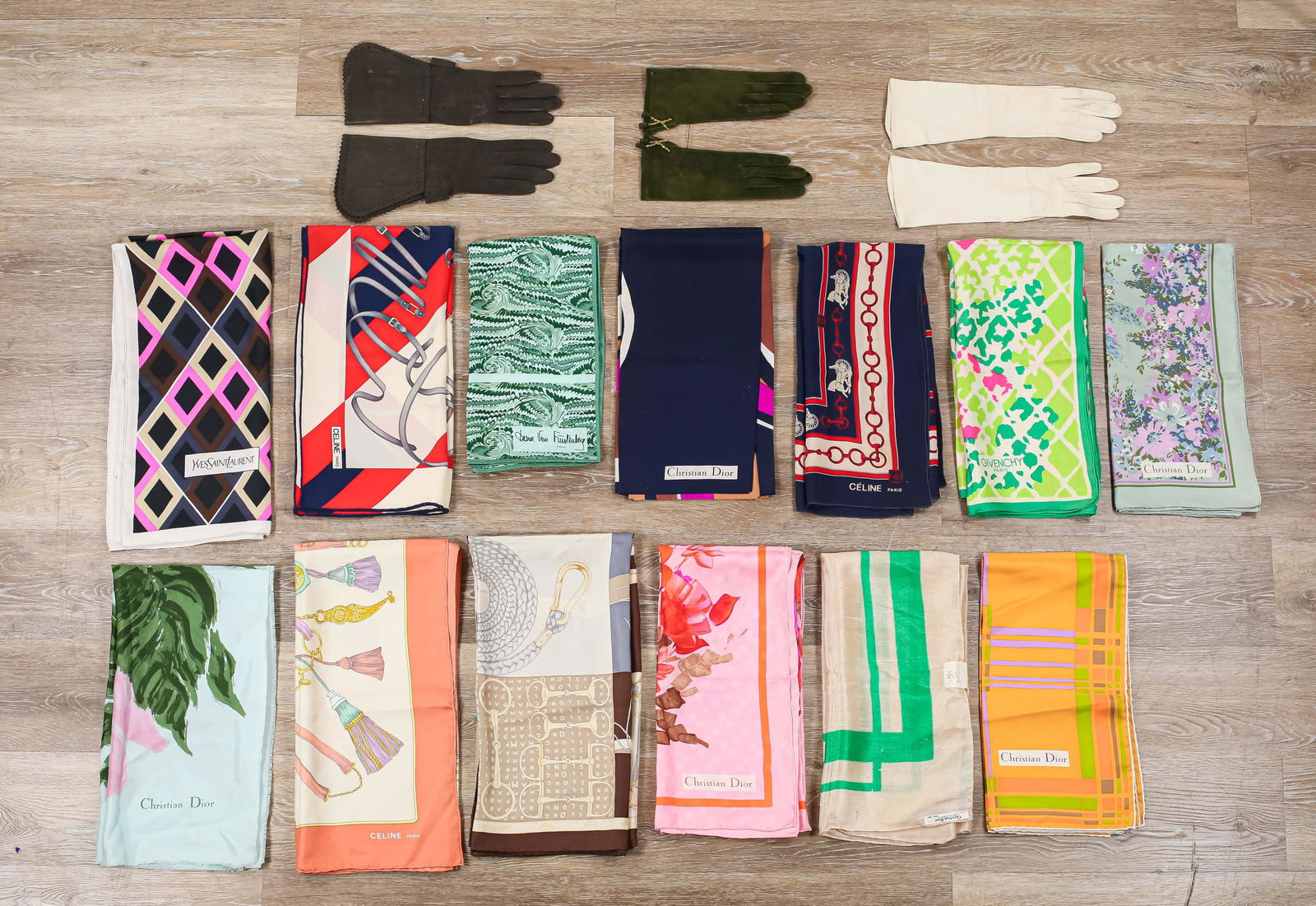 Grouping of Women's Designer Accessories Hermes: 3 Pairs of Gloves: Hermes suede gloves with paper inserts and marked on the interior. Christian Dior suede gloves, marked on the interior. Christian Dior kid gloves, marked on the interior. 14 silk sc