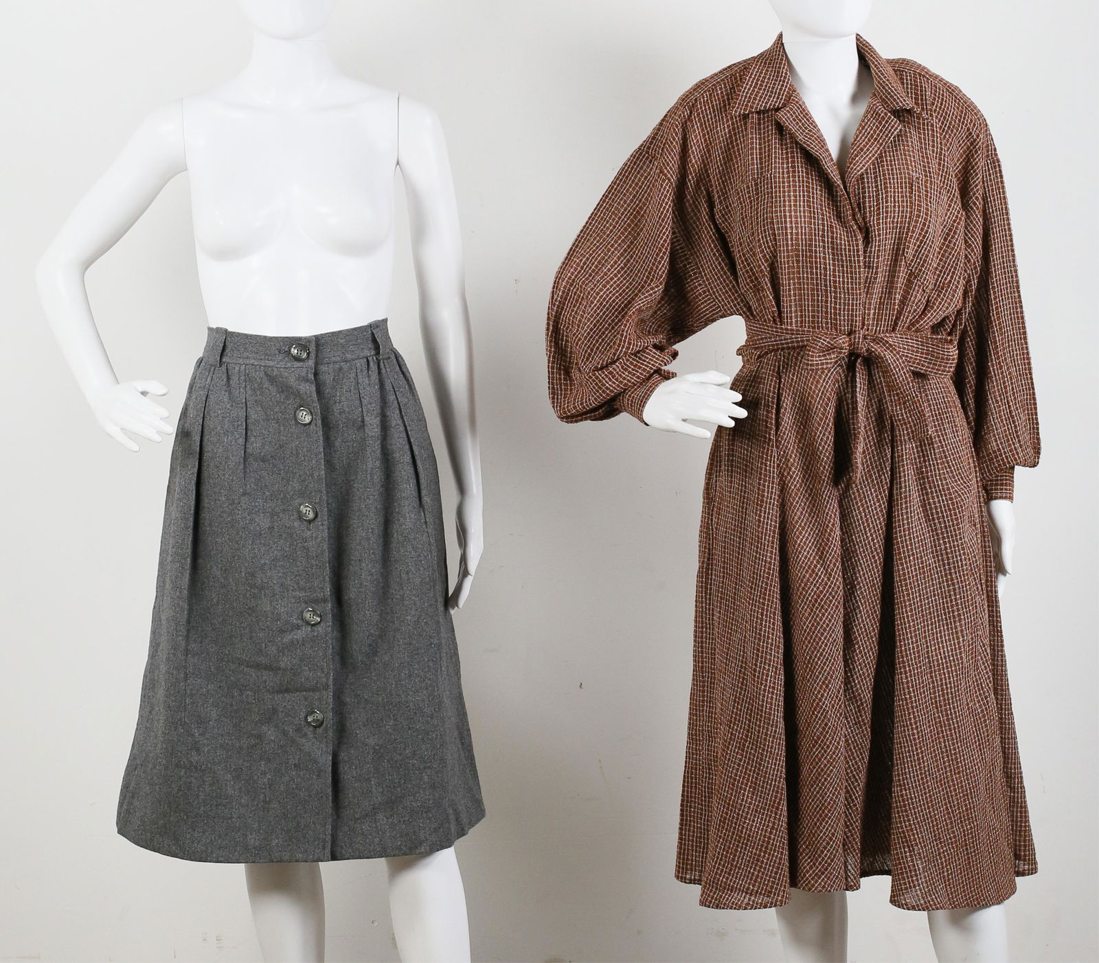 Grouping of Vintage Skirt and Dress: Lot includes Yves St. Laurent Rive Gauche pleated wool button front skirt, pockets, size 42, 27"L, good condition; Norma Kamali plaid dress with tie, size 6, pockets, removable shoulder pads, 43" L, g