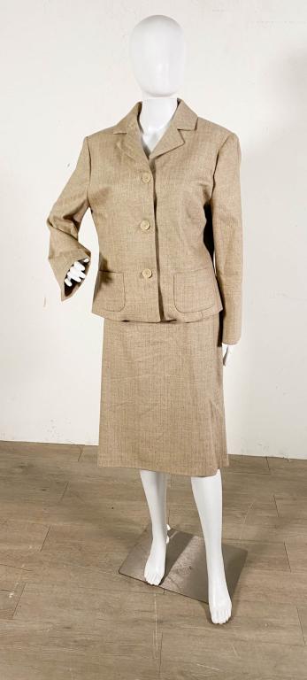 Barney's Wool Skirt Suit: Lot includes Barney's New York three button jacket, size 46, 18" at shoulders, 23"L, 23" sleeve, matching skirt size 46, 36" waist, 25 1/2"L, oatmeal color with metallic threading, 88% wool, 10% silk,