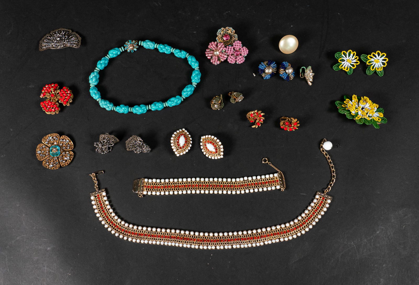 Miriam Haskell & Hobe Costume Jewelry Lot: Lot of Hobe and Miriam Haskell costume jewelry. Miriam Haskell brooch & earring set, necklace, 2 pairs earrings, 2 single earrings, 3 brooches, bead jewelry including brooch and earring set, pair earr