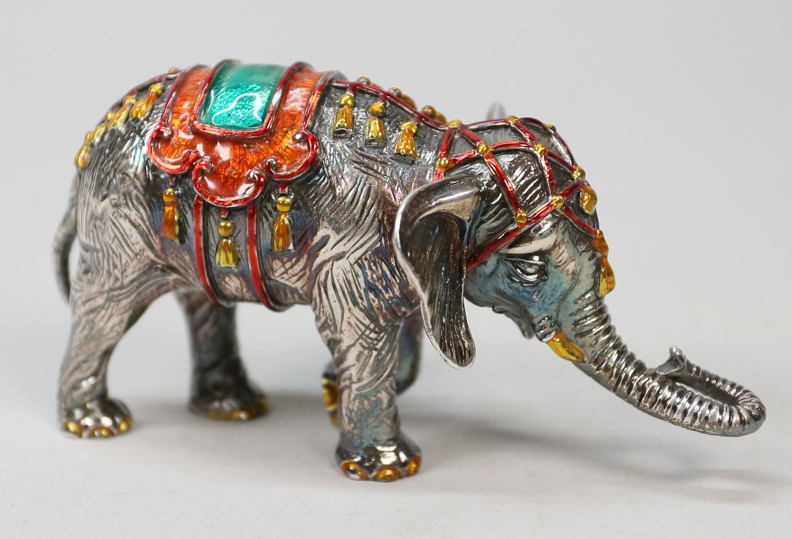 Gene Moore Sterling Tiffany & Co. Elephant: Gene Moore (Alabama 1910-1998) for Tiffany and Company. Sterling silver elephant which is part of a circus set. Made in Italy. circa 1990. Marked "Tiffany & Co Sterling". 2" Tall 10.32 OZT