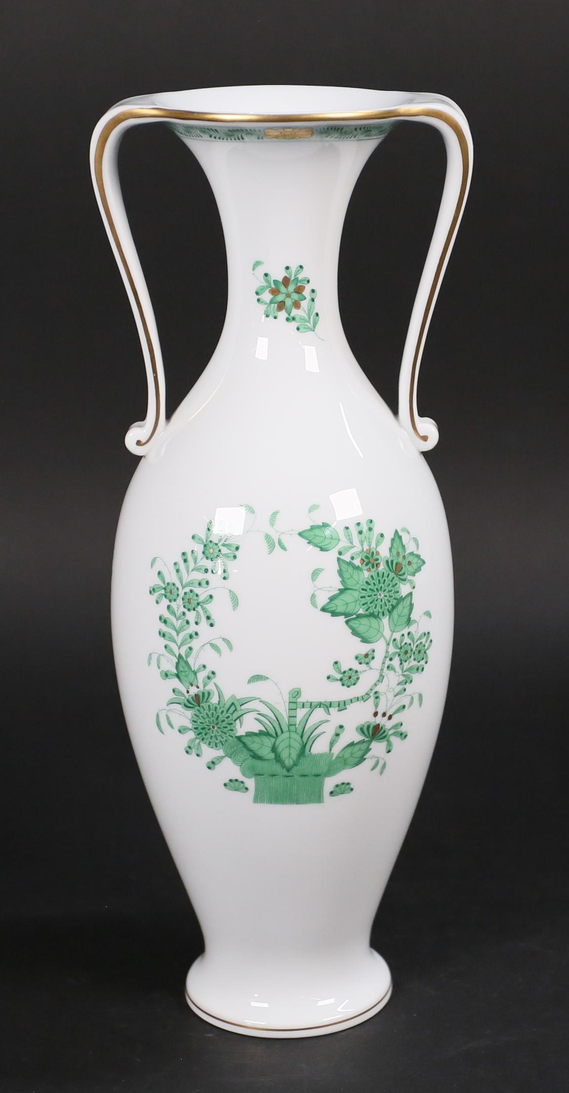 Herend Chinese Bouquet Porcelain Vase: Herend (Hungary, 1826-). Porcelain two handled vase in the Chinese Bouquet Green pattern. Contemporary Herend Hungary Hand Painted mark and incised Herend mark on underside. 13"H