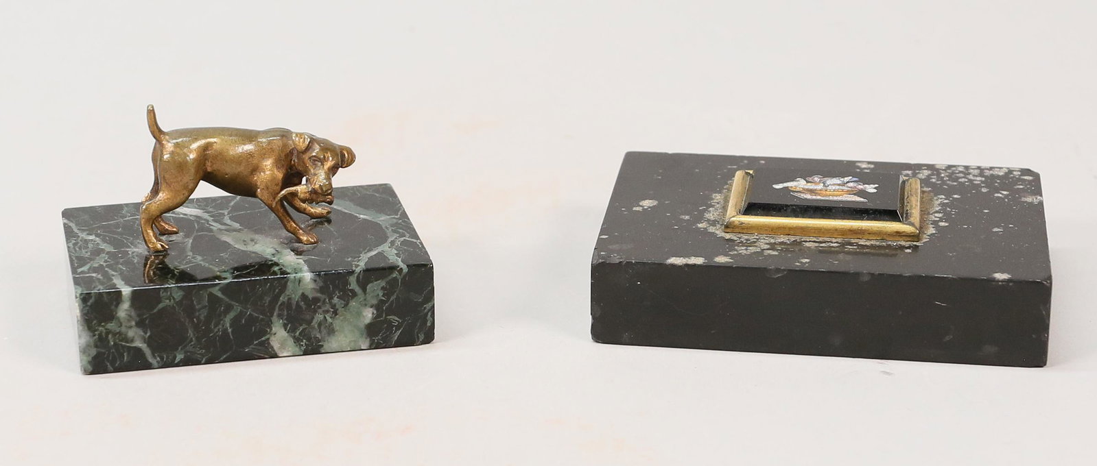 2 Paperweights Bronze & Micromosaic: 2 paperweights. Bronze dog on marble base, unsigned, dog 1 1/8"L, with base 3"L x 2"W x 1 3/4"H; micro mosaic Doves of Pliny, micromosaic 1" x 1 1/4", with base 3 3/4"L x 2 3/4"W x 1"H. Chips to corne