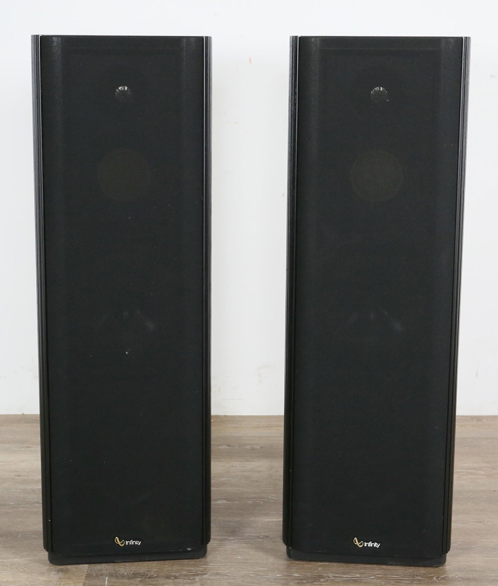 Pair of Infinity Kappa 6.1 Speakers: Pair of Infinity Kappa 6.1 speakers. 20th century. Black painted wood case and foam. "K000150 20617" and K000153 20617" is labeled on back of speakers. Both speakers have been tested and work. Light s