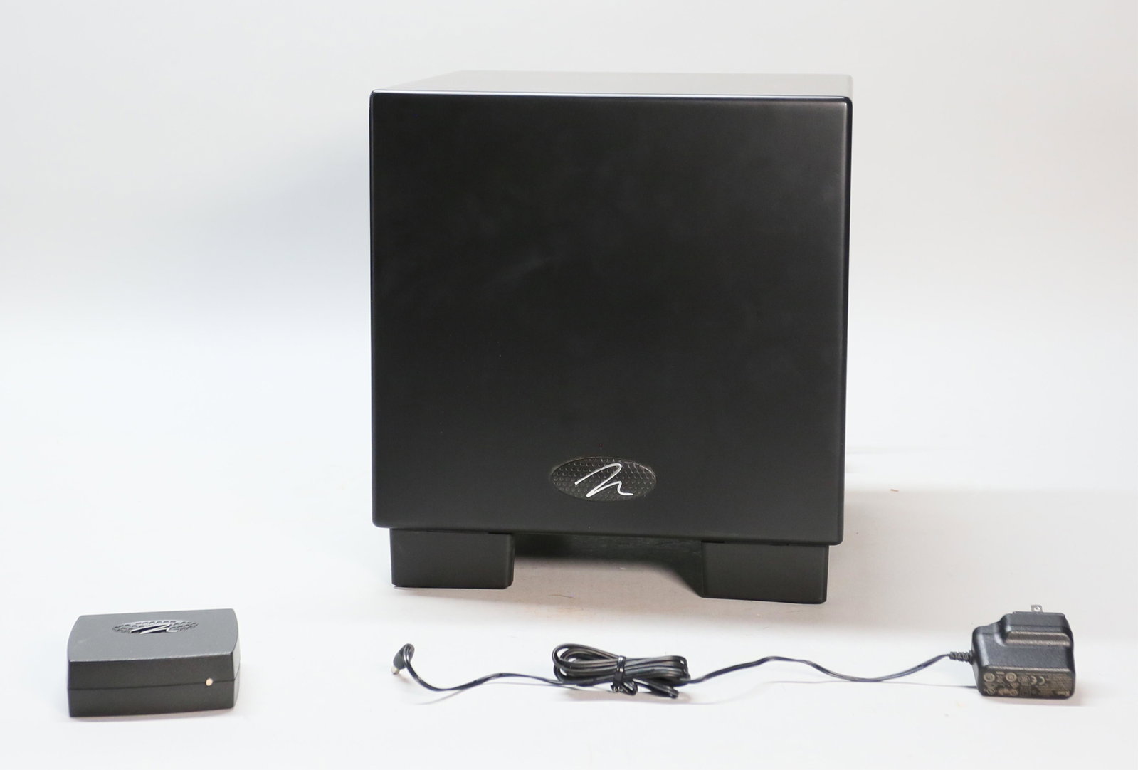 Martin Logan Dynamo 700W Subwoofer System: Martin Logan Dynamo 700W subwoofer system. America and China, 2010. Subwoofer system with SWT-2 subwoofer wireless transmitter. Serial number "DY2DDG4731" label on back of subwoofer. Subwoofer system 