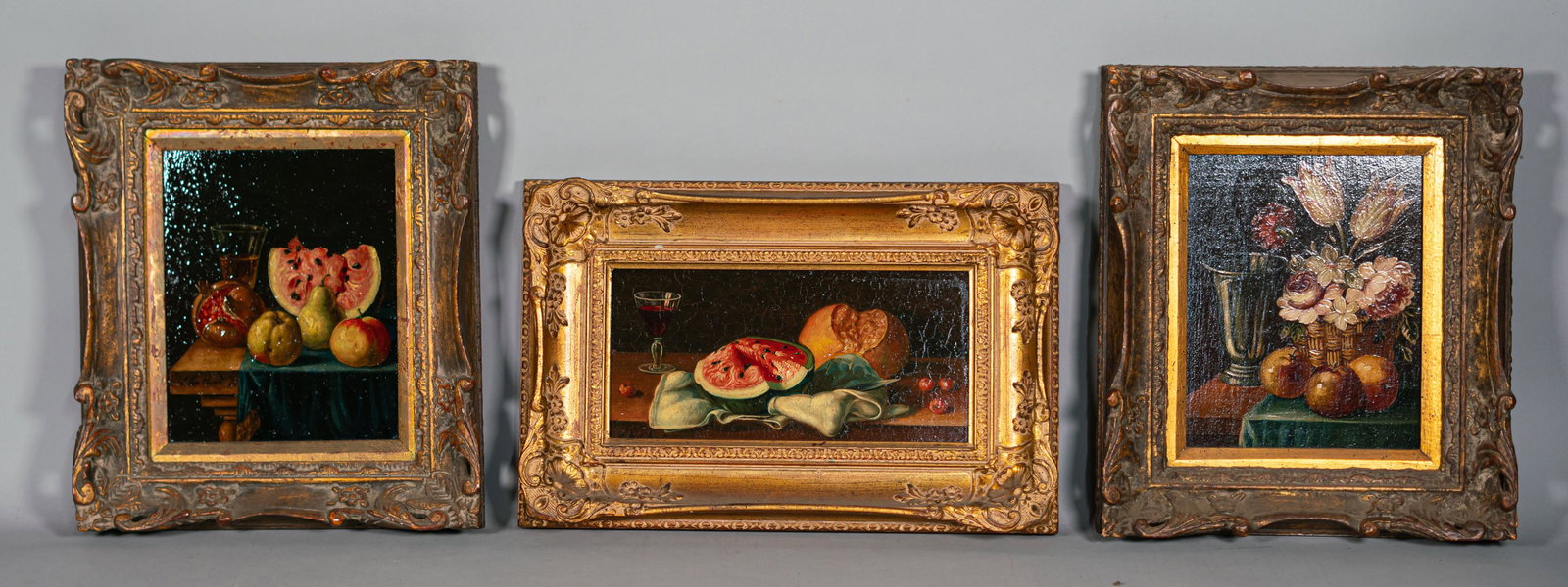 3 J. Van Hoot Oil on Board Still Lifes: 3 oil still lifes. 2 on Masonite, still lifes with fruit and wine, 5 1/2" x 11 1/2" (with frame 11 1/4" x 17 1/4") and 9 1/2" x 7 1/2" (with frame 15" x 13"); 1 on wood panel, still life with flowers