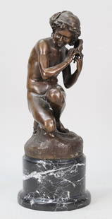 After Jean Baptiste Carpeaux Bronze Sculpture: After Jean Baptiste Carpeaux (French, 1827-1875). "Neapolitan Fisher Boy". Bronze sculpture of boy holding shell to ear, resting on a marble base. No apparent marks or signature. Pitting on surface