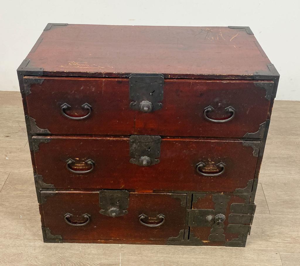 Japanese Meiji Clothing Chest: Japanese Meiji Clothing Chest Japanese clothing chest. Japanese, late Meiji Era (1910's). Cypress, brass handles and drawer pulls. Damage on bottom right compartment, inside drawer has loss. Loss to w