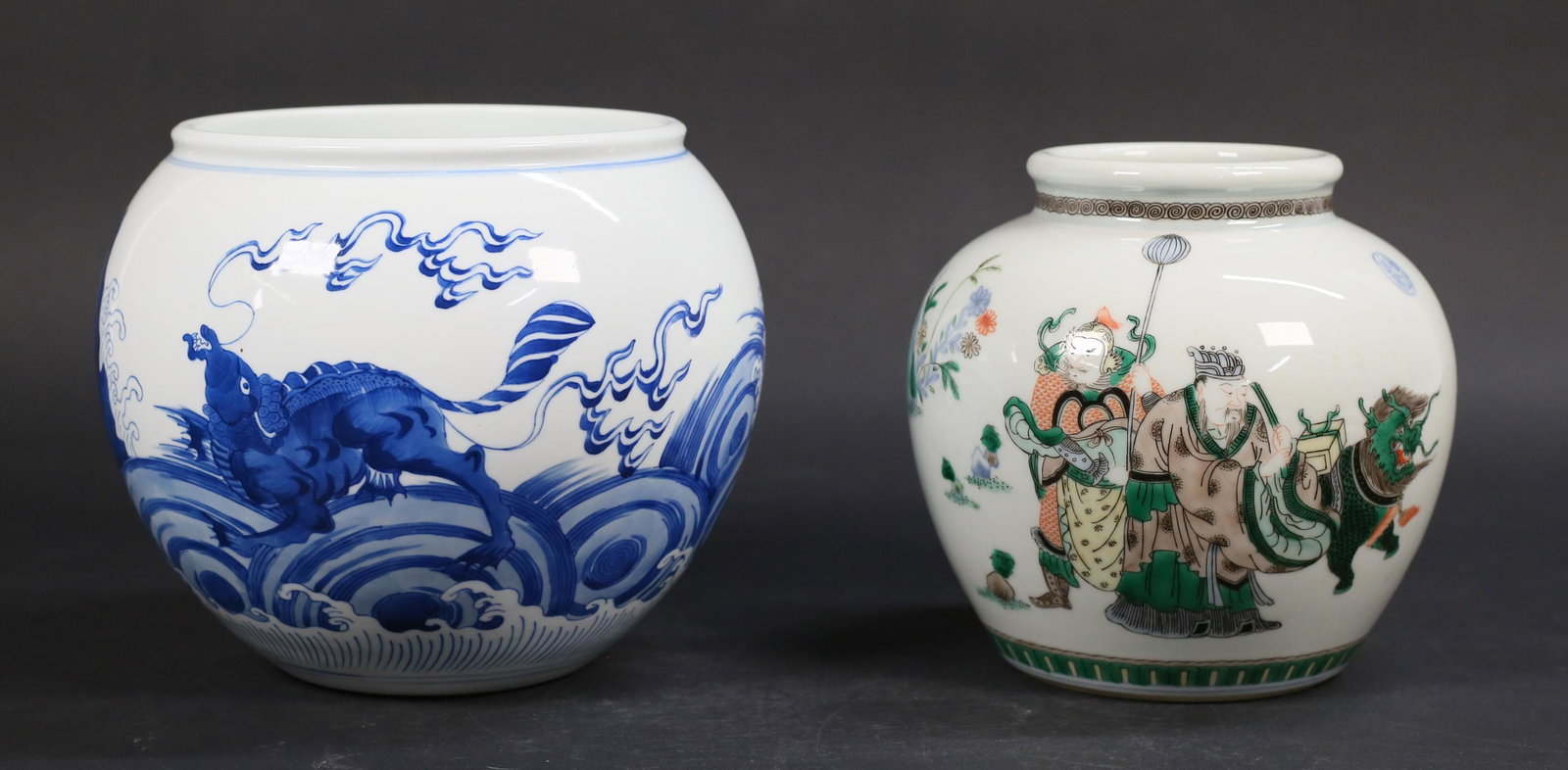 2 Chinese Porcelain Jars: 2 Chinese porcelain jars or vases. Blue and white with dragon motif, 7 1/8"H x 6 3/8"-diameter at top; famille verte with figures and dragon, six character Kangxi mark in blue on underside and additio