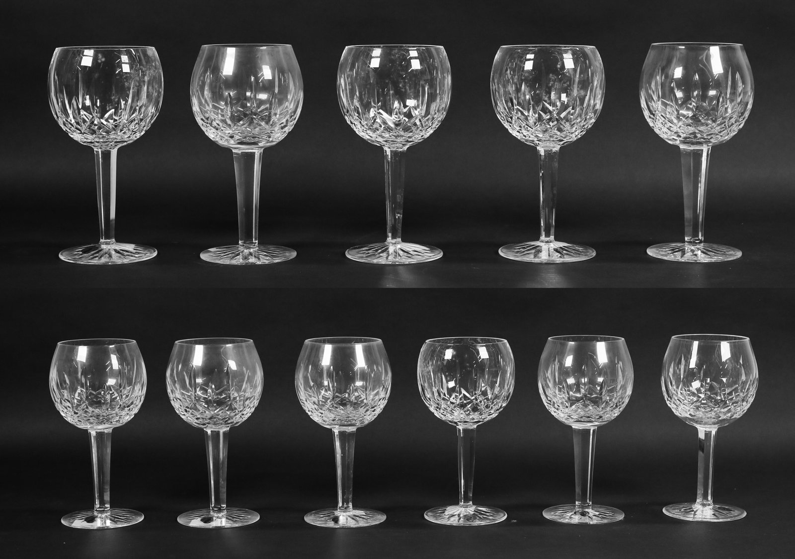 11 Waterford Lismore Crystal Oversize Red Wine: 11 Waterford Lismore Crystal oversize red wines, 7 7/8"H. In original boxes with paper labels. Never Used. Wear and staining to Boxes.