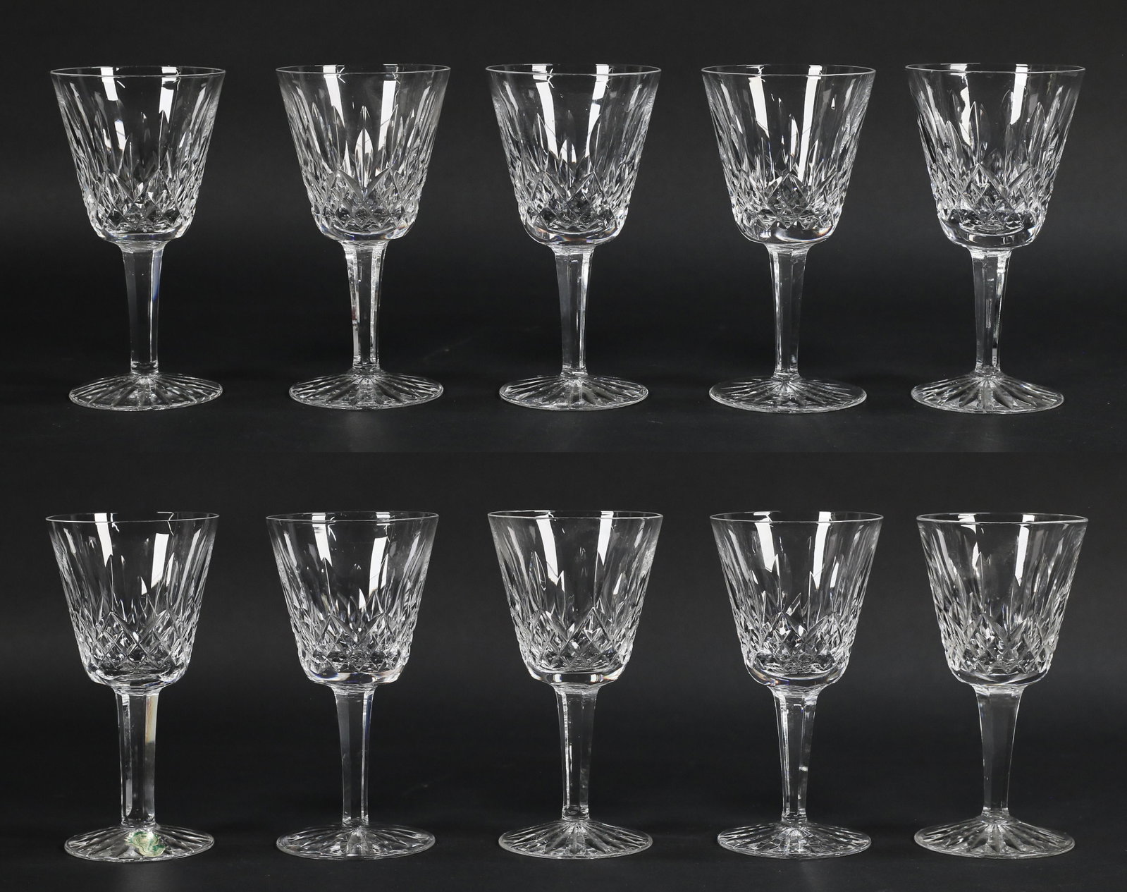 10 Waterford Lismore Crystal Claret Wine Glasses: 10 Waterford Lismore crystal claret wines, 1 with paper label. No chips or cracks, surface scratches from light use. 5 7/8"