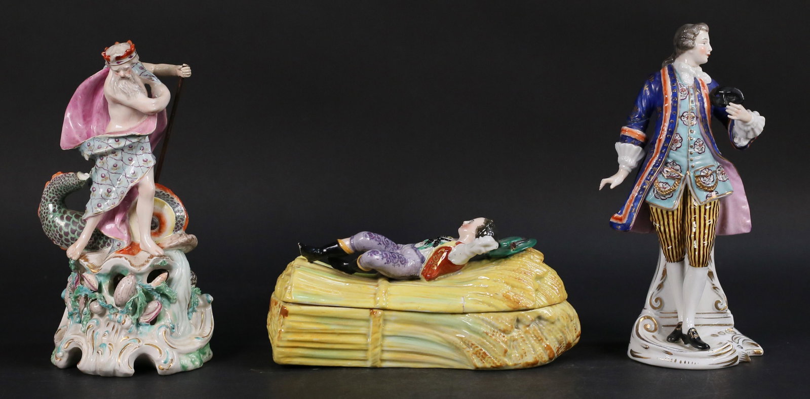 3 Chelsea or Samson Porcelain Figures: 3 English porcelain figures. Chelsea or Derby figure of Neptune with dolphin on bed of seaweed and shells. Chelsea or Samson figure of a gentleman with mask. Gold anchor mark on reverse of base. Lidde