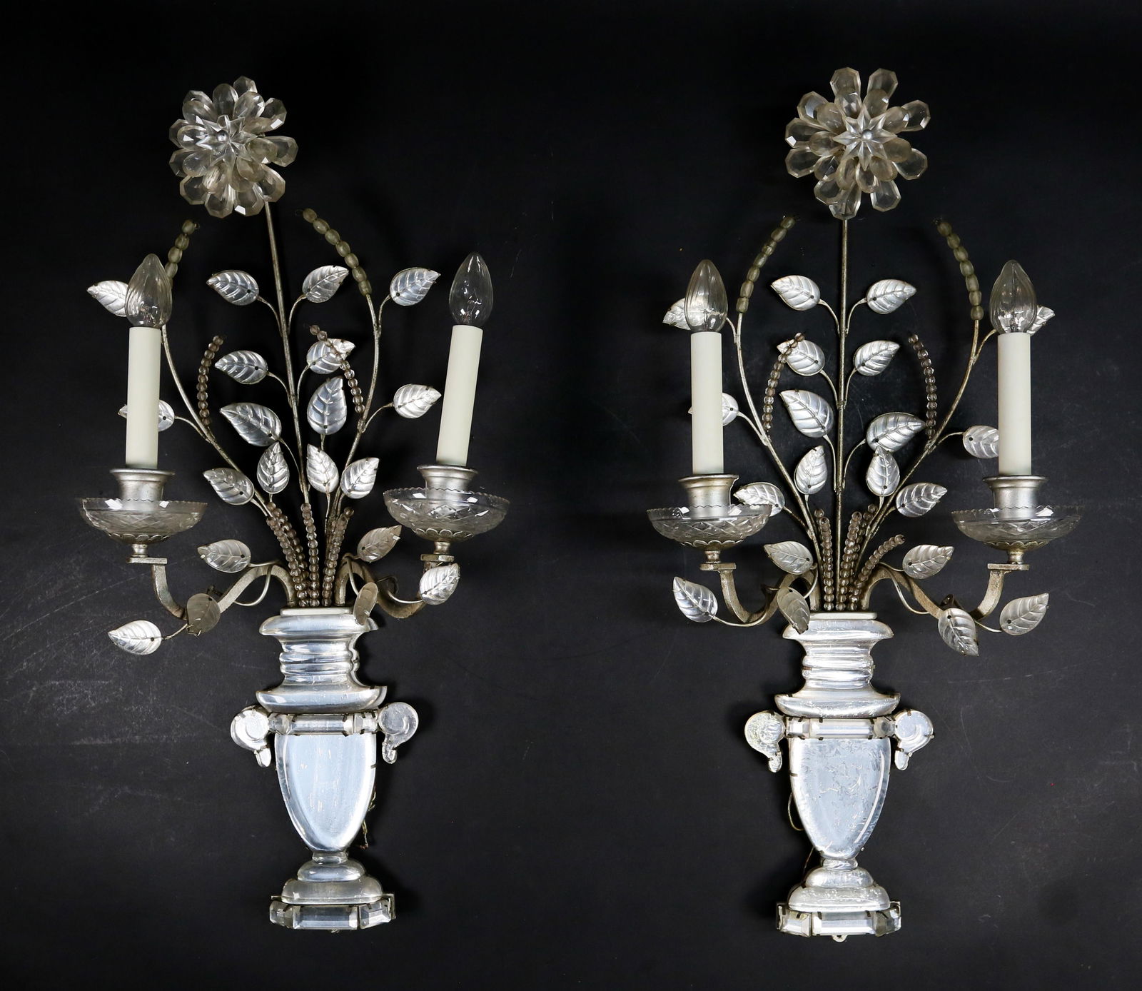 Pair of Maison Bagues Style French Crystal Sconces: Pair of French Maison Bagues style crystal sconces. Each 26 1/2"L to top of flowers. Crack and chip to one candle cup, top of one slightly bent.