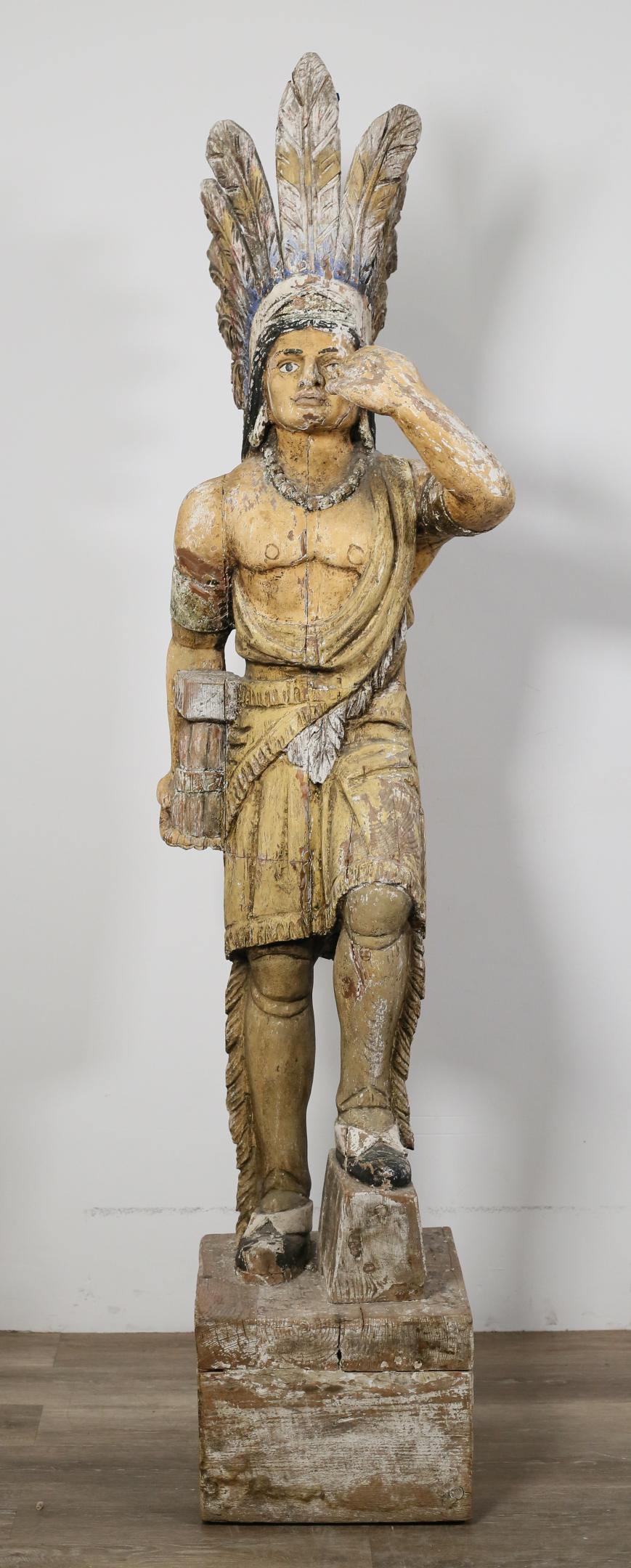 Cigar Store Indian in the Style of Thomas Brooks: Cigar store Indian trade figure in the style of Thomas Brooks (American, New York, 1828-1895). Late 19th/early 20th century. American Indian chief with polychromatic tobacco leaf headdress with left h