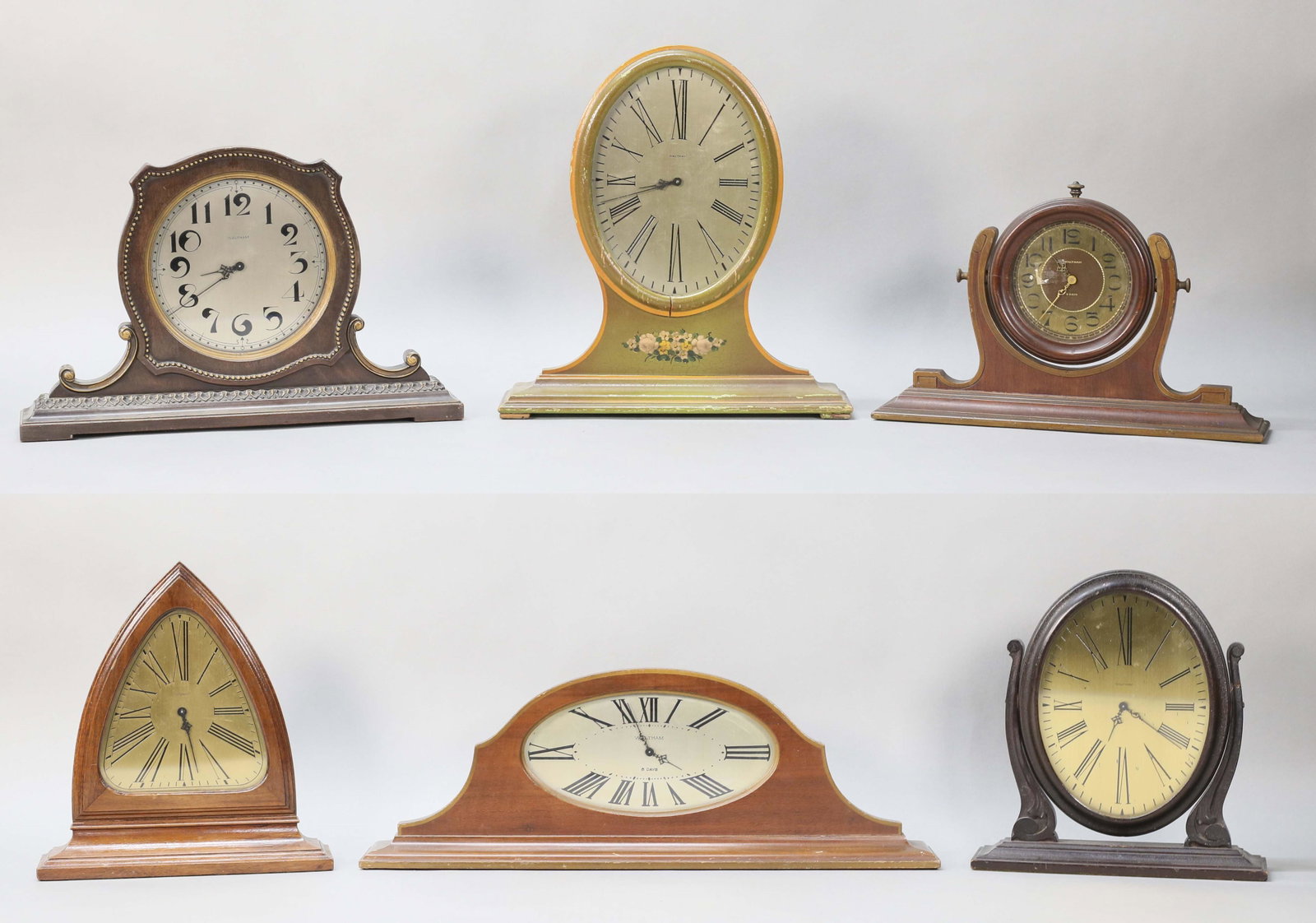 6 Waltham Dresser & Mantel Clocks: 6 Waltham clocks including dresser, mantel, shelf and swivel clocks. Clock with painted floral decoration 13 1/8"H, largest 8 days clock 20 5/8"L. All with scratches, chips and minor losses. Painted c