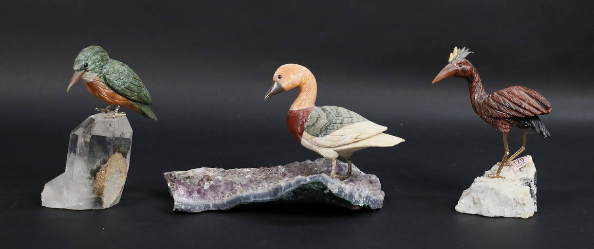 Three Carved Stone Bird Sculptures On Minerals