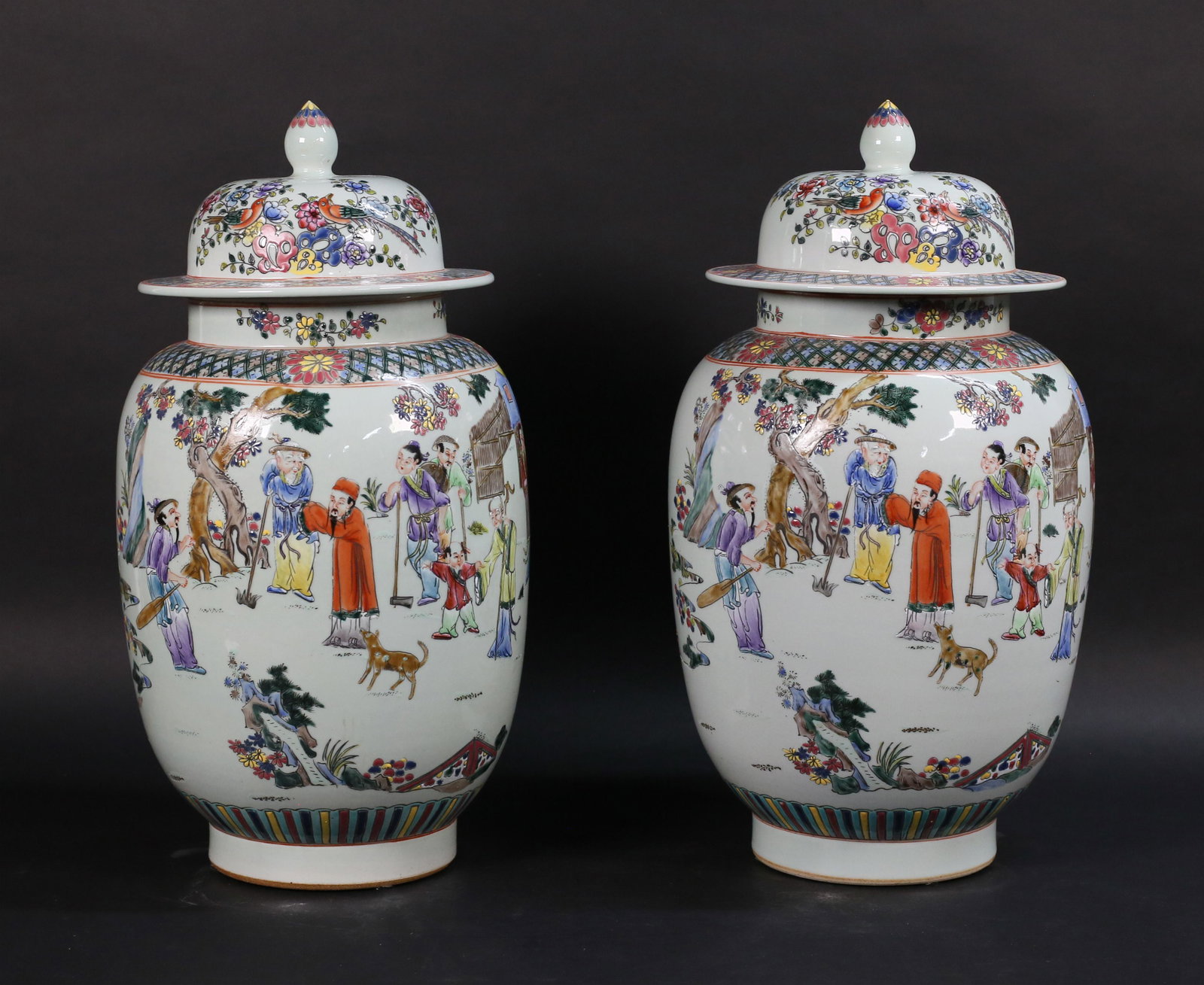 Pair of Chinese Porcelain Ginger Jars: Pair of Chinese porcelain ginger jars. Polychrome with scenes of every day life. Blue six character marks to the undersides. Each 16"H.