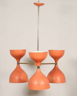 Stilnovo Style Mid Century Modern Chandelier: Mid Century Modern atomic chandelier in the style of Stilnovo. Mid 20th century. Three orange metal shades and brass rails. Lighting has not been tested. Underwriters' Laboratories label on inside of