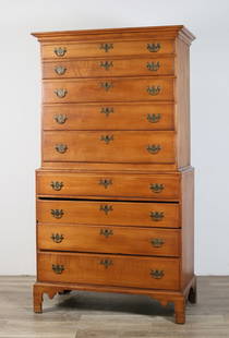 Federal Chippendale Chest on Chest: Federal Chippendale chest on chest. 19th century. Nine drawers, brass hardware, and bracket feet. Wear throughout wood. Scratches, marks and scuffs to wood on left sides. Split and repairs to feet. Se