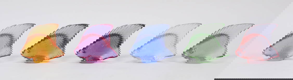 5 Lalique Crystal Fish Figurines: 5 signed Lalique crystal fish figurines, in 5 colors. Each signed Lalique France on the base. Each 1 3/8"H. Tail fin chipped on lighter pink fish.