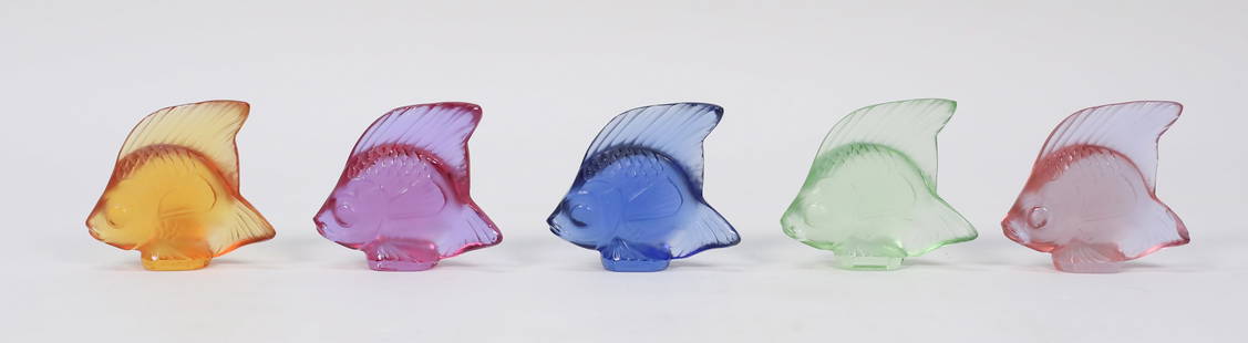 5 Lalique Crystal Fish Figurines: 5 signed Lalique crystal fish figurines, in 5 colors. Each signed Lalique France on the base. Each 1 3/8"H. Tail fin chipped on lighter pink fish.