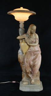 G. Mascagni Signed Italian Art Deco Alabaster Lamp: G. Mascagni (Italian, 20th century). Figural Art Deco Egyptian Revival alabaster lamp. Woman with urn sitting against rock supporting lamp. Lid of lamp marked "Italy //31". "G. Mascagni" signed into a