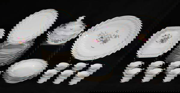30 Pieces KPM Kurland Form Porcelain Dinnerware: 30 pieces KPM porcelain dinnerware, Kurland form, with gilt and green enamel rims with white swags, serving pieces with hand painted decoration of flowers and butterflies.12 dinner plates, 4 bowls, 11