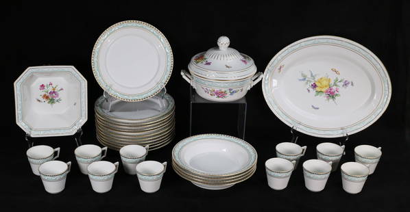 30 Pieces KPM Kurland Form Porcelain Dinnerware: 30 pieces KPM porcelain dinnerware, Kurland form, with gilt and green enamel rims with white swags, serving pieces with hand painted decoration of flowers and butterflies.12 dinner plates, 4 bowls, 11