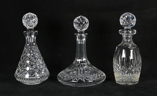 3 Waterford Crystal Decanters: 3 Waterford crystal decanters. Lismore pattern ship's decanter, Lismore pattern spirit decanter, Alana pattern decanter. Ship's decanter 10"H including stopper. All with etched Waterford marks. Alana